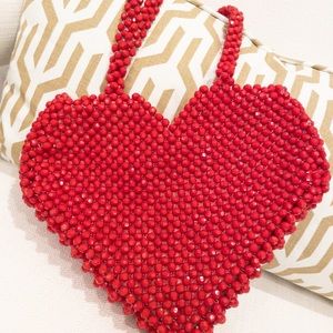 Red beaded heart shaped shoulder bag. Channel your inner Emily in Paris!